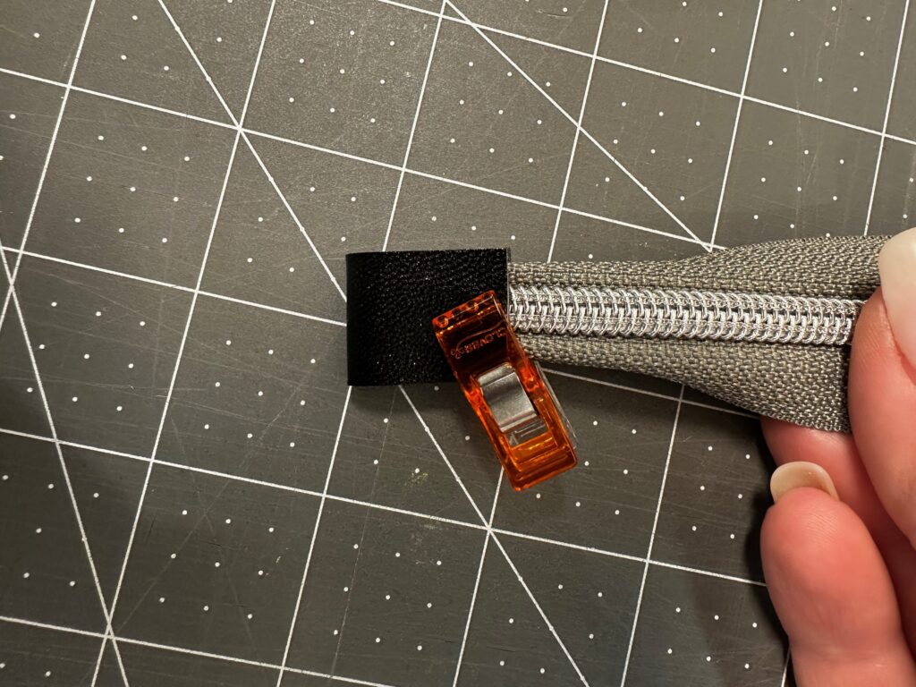 clipping fabric zipper stop