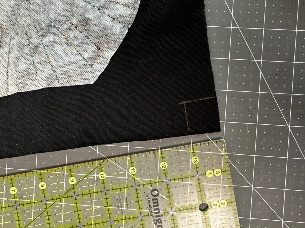 marking pouch lower edge for boxed corner