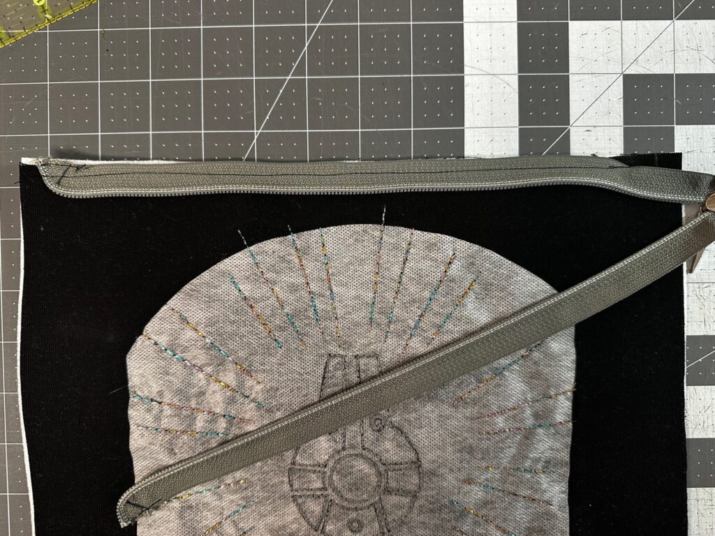 one zipper tape edge stitched