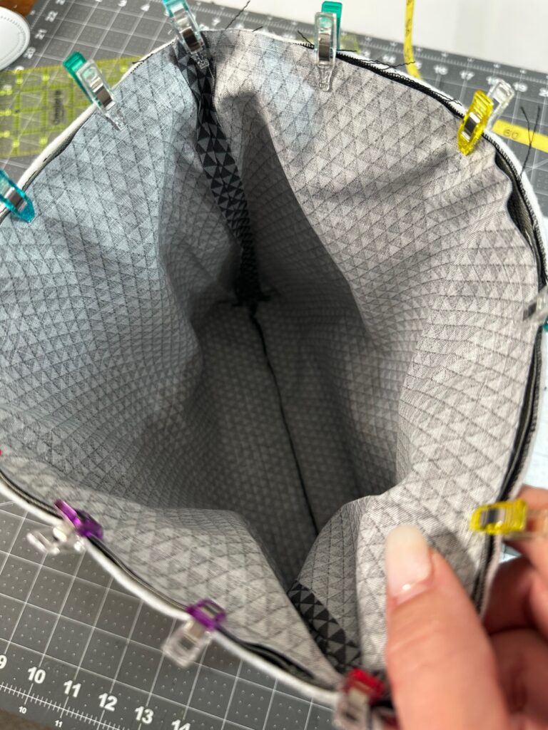 clipping upper edge of pouch