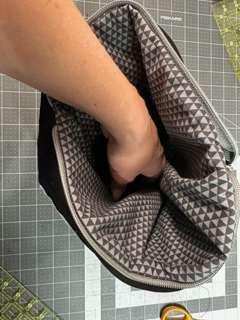 pushing lining into pouch
