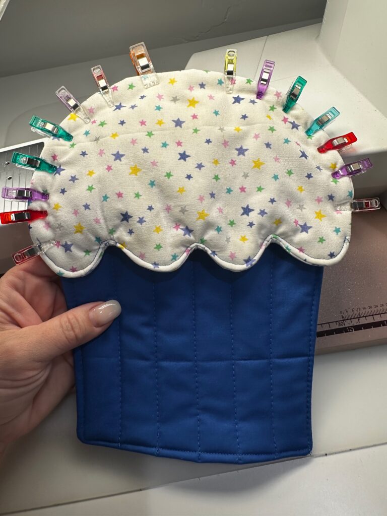 clips securing potholder top