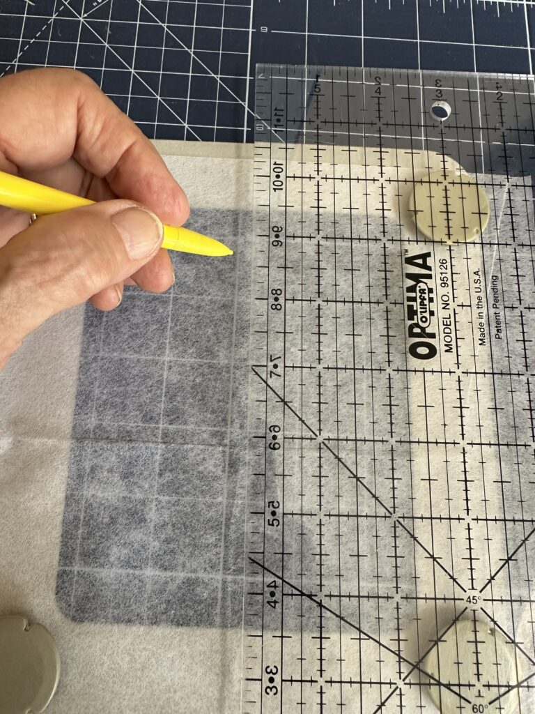 marking lines onto stabilizer for design placement
