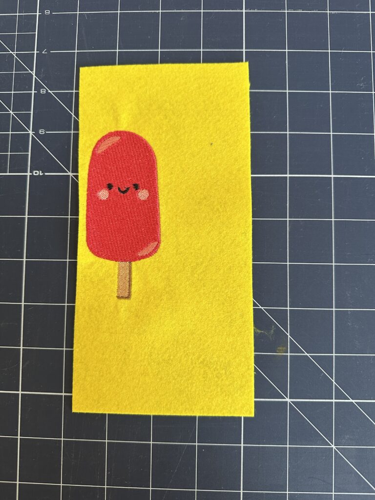 finished Felty embroidery for popsicle koozie