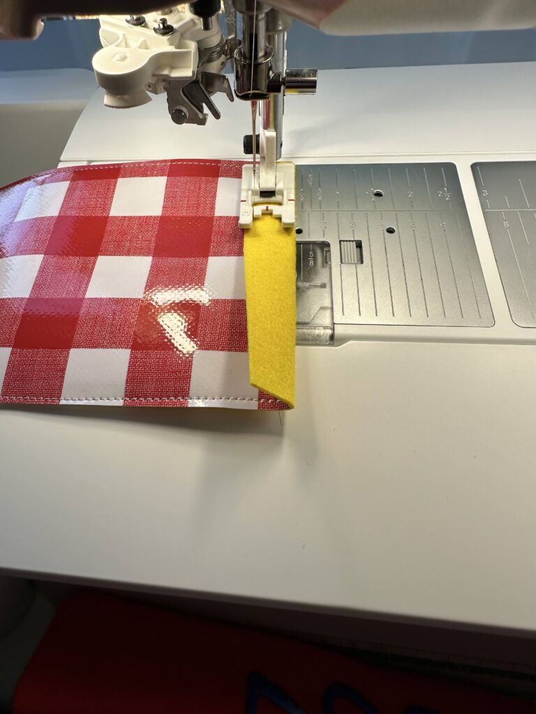tostitching hem in place for koozie