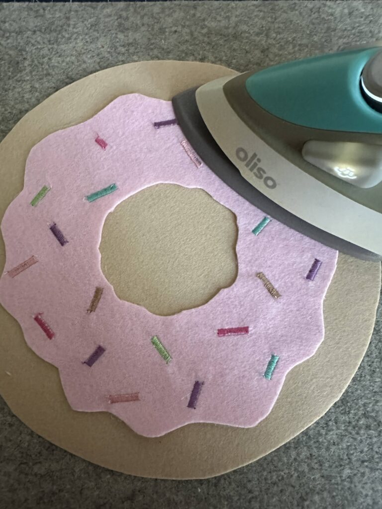 fusing icing to one donut piece