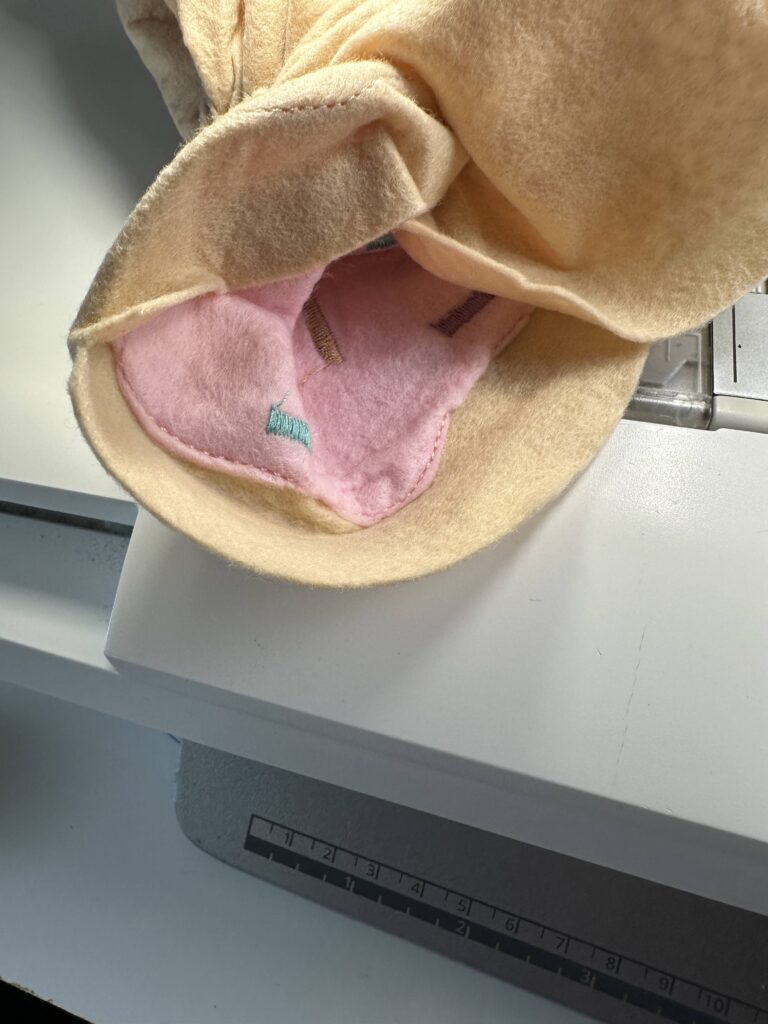 continue stitching, pulling fabric through tunnel