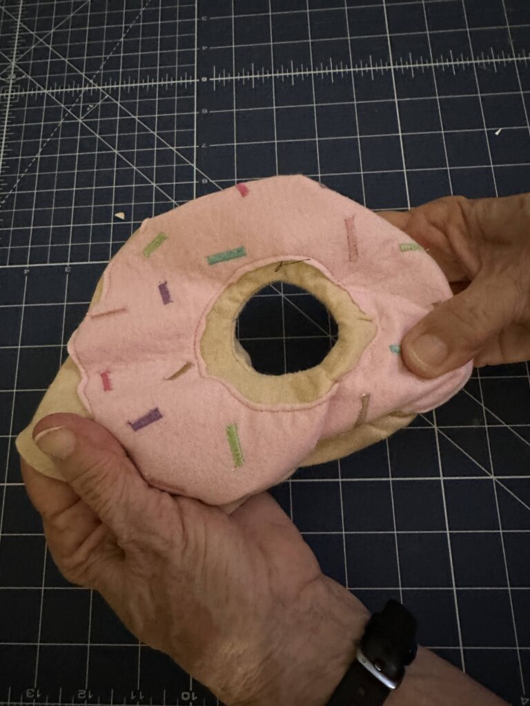 smooth outer donut seams using fingers