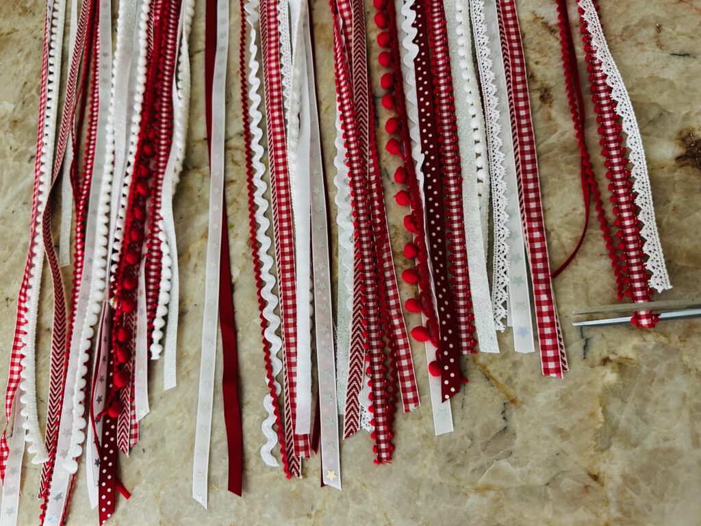 trimming uneven ends of ribbon for flag