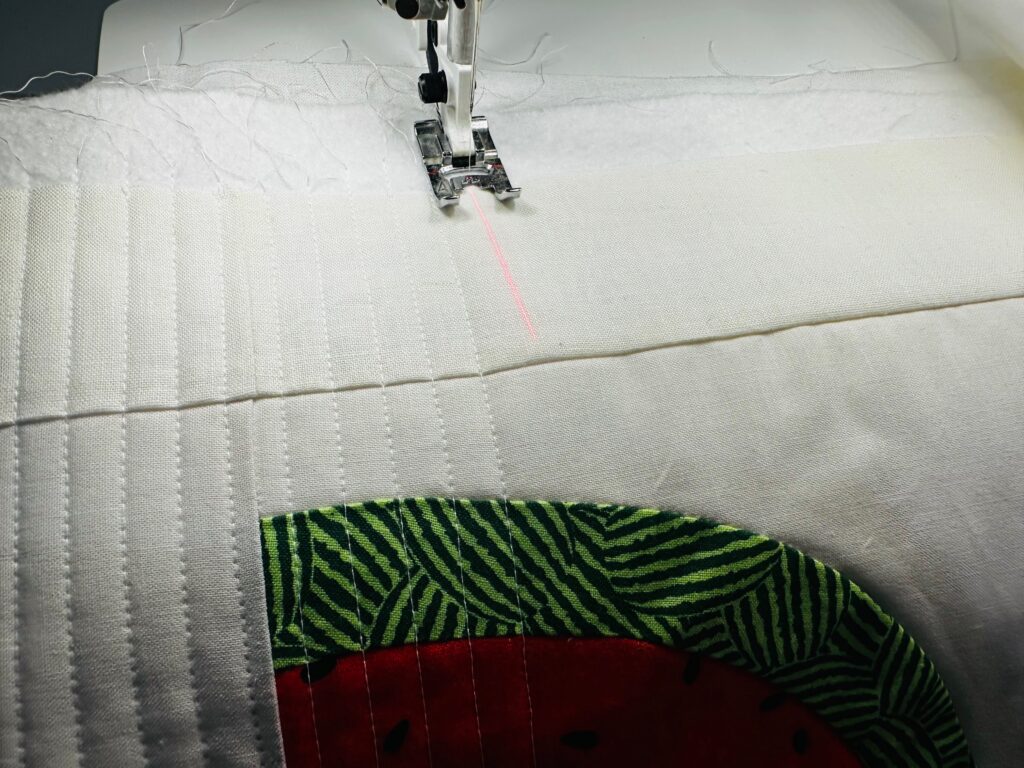 straight line quilting on watermelon blocks