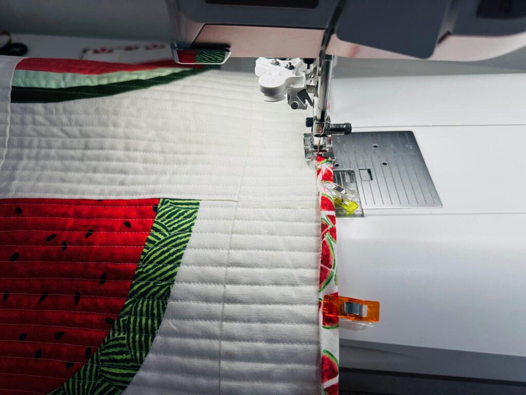 binding the watermelon table runner