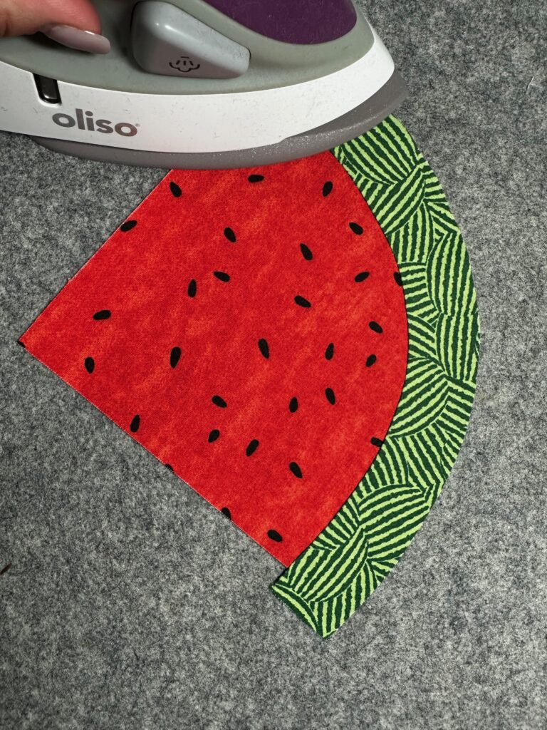 pressing watermelon quilt block