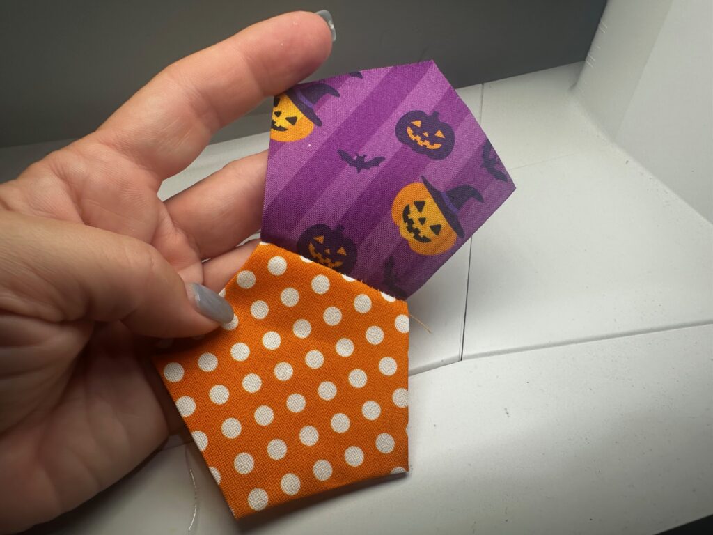folding hexagons to the right side to check stitching