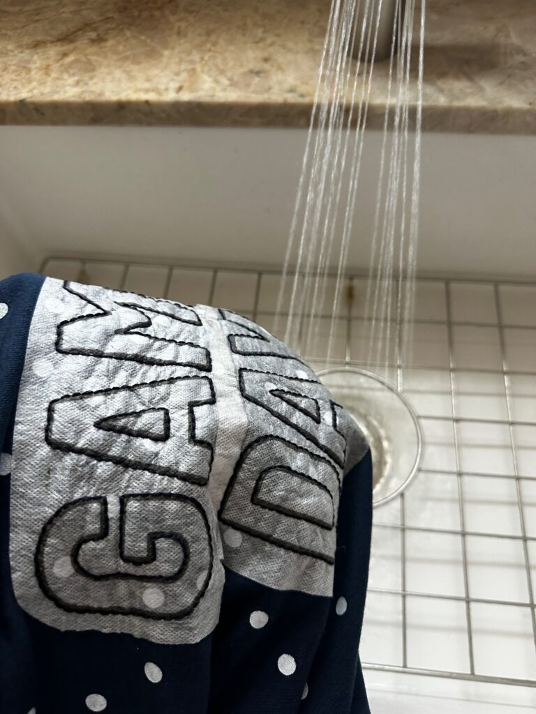 rinsing away Stick 'n Stitch