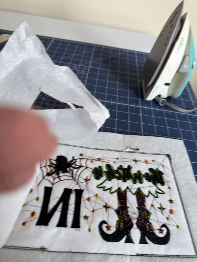 tearing away Stiffy from door hanger